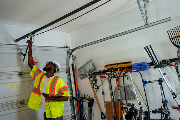 Professional Garage Door Panel Replacement technician working in Schlusser, PA